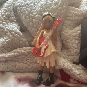 poppy baddie on bass popmart and peach riot